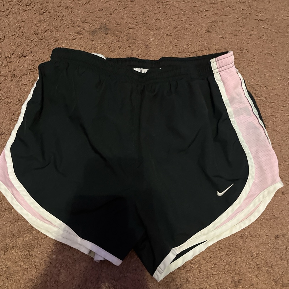 Pink white and black nike shorts